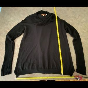 Long sleeve black sweater with sexy open back style